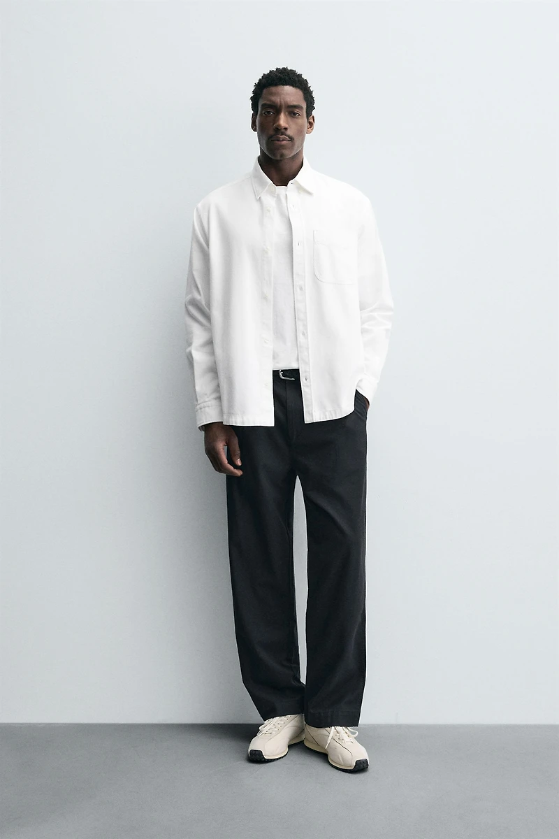 RELAXED FIT PLEATED PANTS