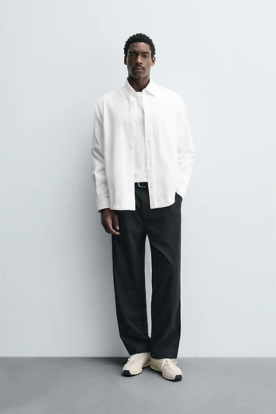 RELAXED FIT PLEATED PANTS