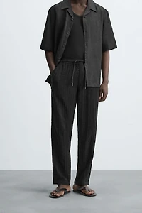 TEXTURED RELAXED FIT PANTS