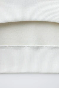 FLOCKED TEXT SWEATSHIRT