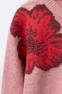 PULL EN MAILLE À FLEURS ET FANTAISIE