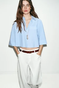 SHORT SHIRT WITH STRIPED FLAPS
