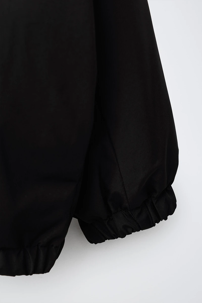 WATER REPELLENT TECHNICAL RAINCOAT