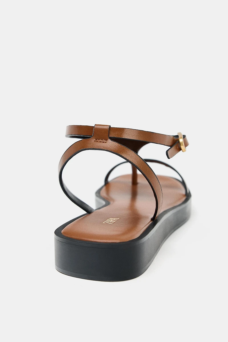 STRAPPY PLATFORM SANDALS