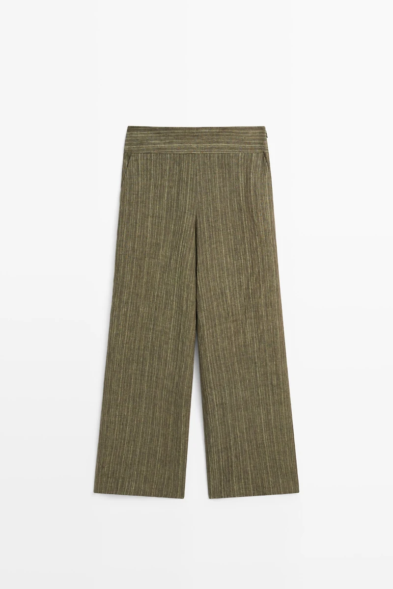 Total look linen trousers with corset belt detail