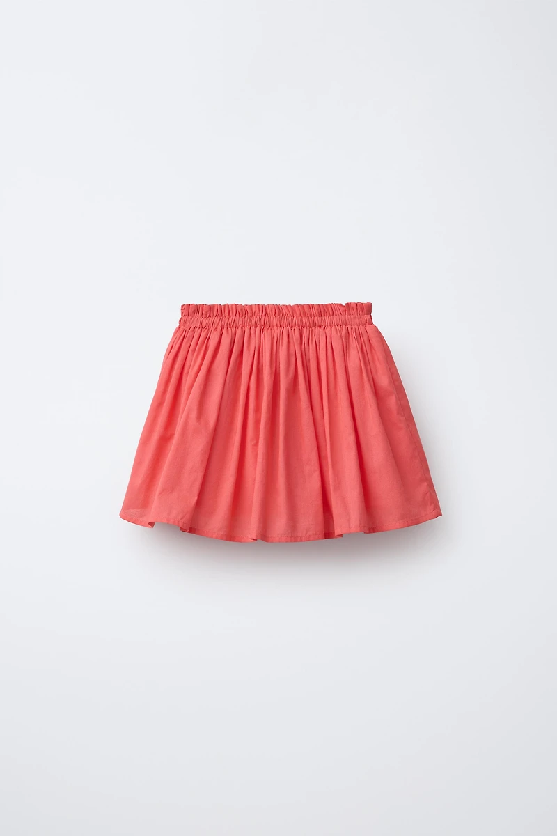 BUTTON SKORT