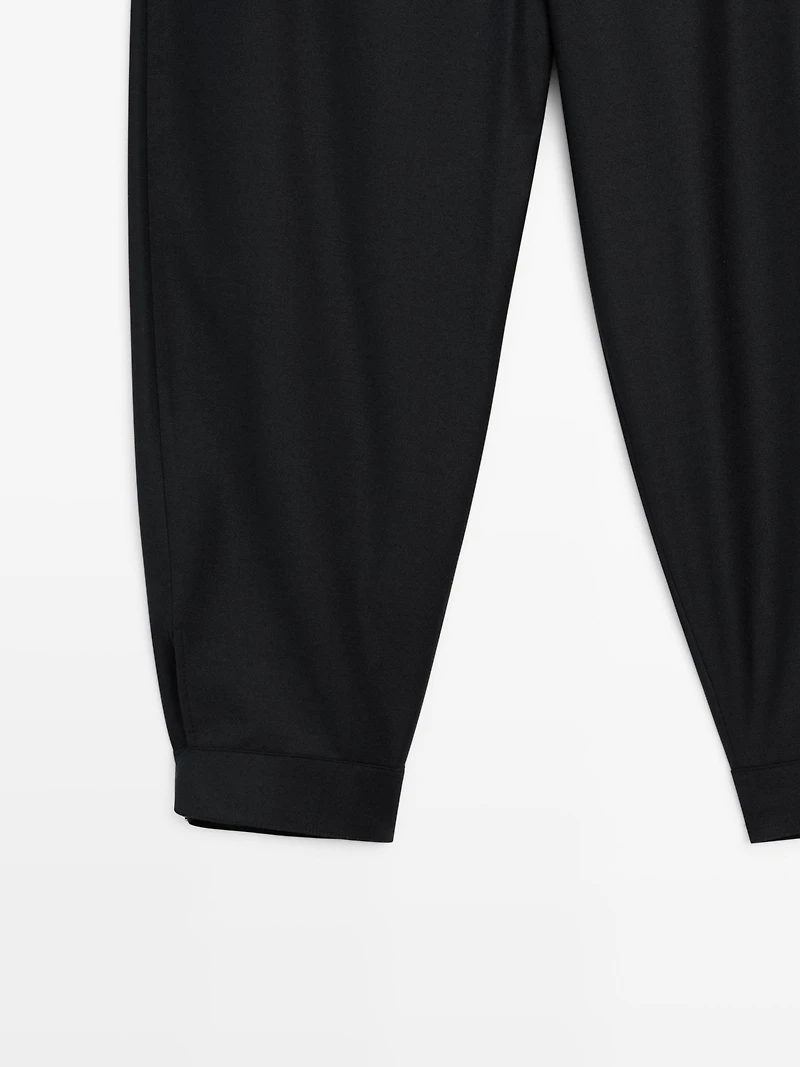 Wool blend sarouel trousers with buckle