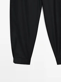 Wool blend sarouel trousers with buckle