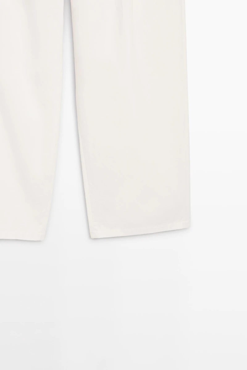 Pantalon à plis et fermeture croisée - STUDIO