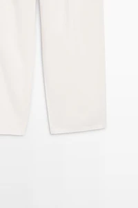 Pantalon à plis et fermeture croisée - STUDIO