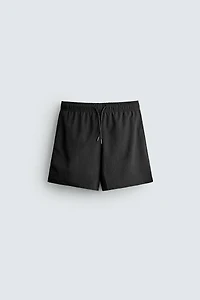 TEXTURED MID-LENGTH SWIMSUIT