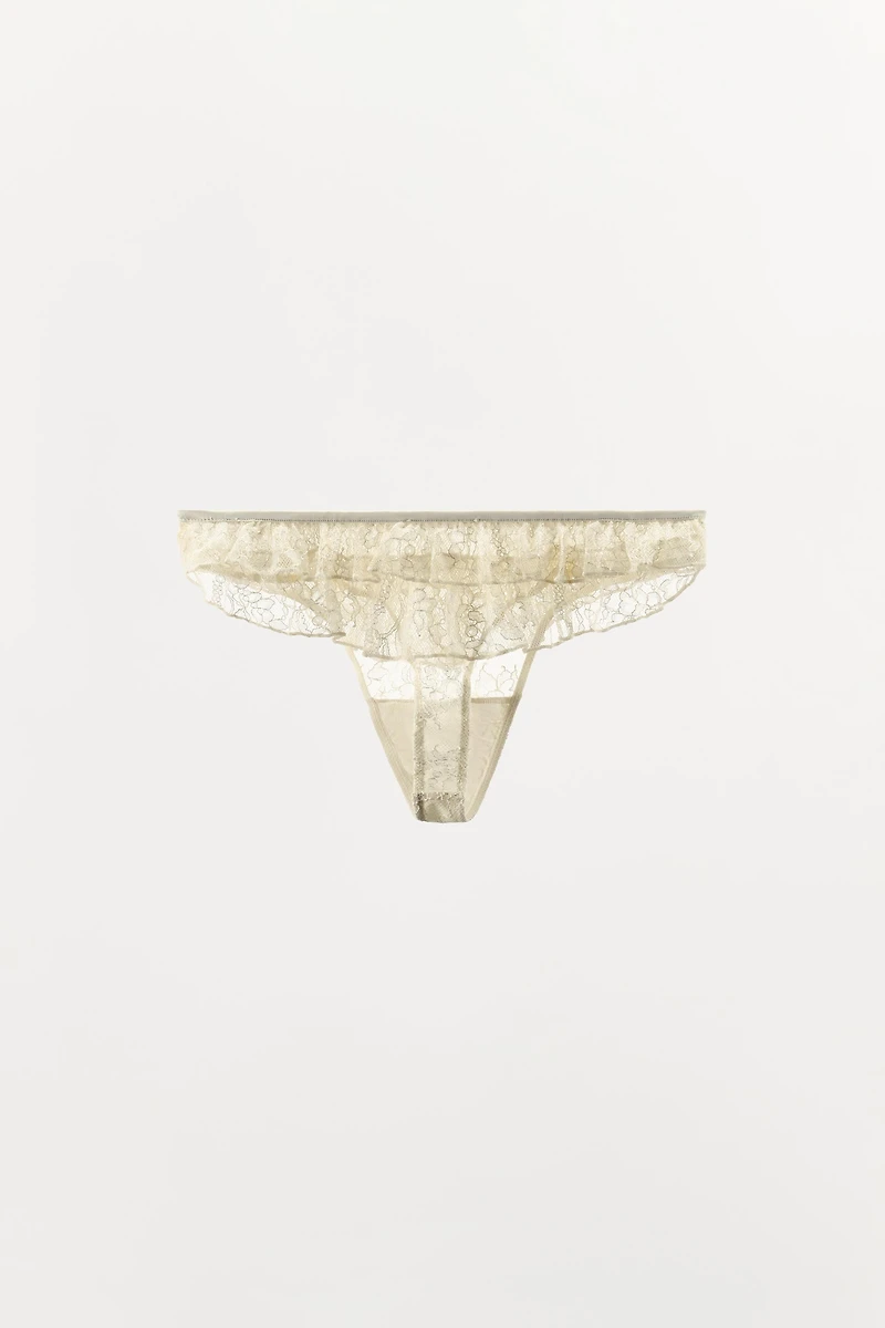 TANGA EN DENTELLE À VOLANTS