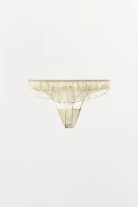 TANGA EN DENTELLE À VOLANTS