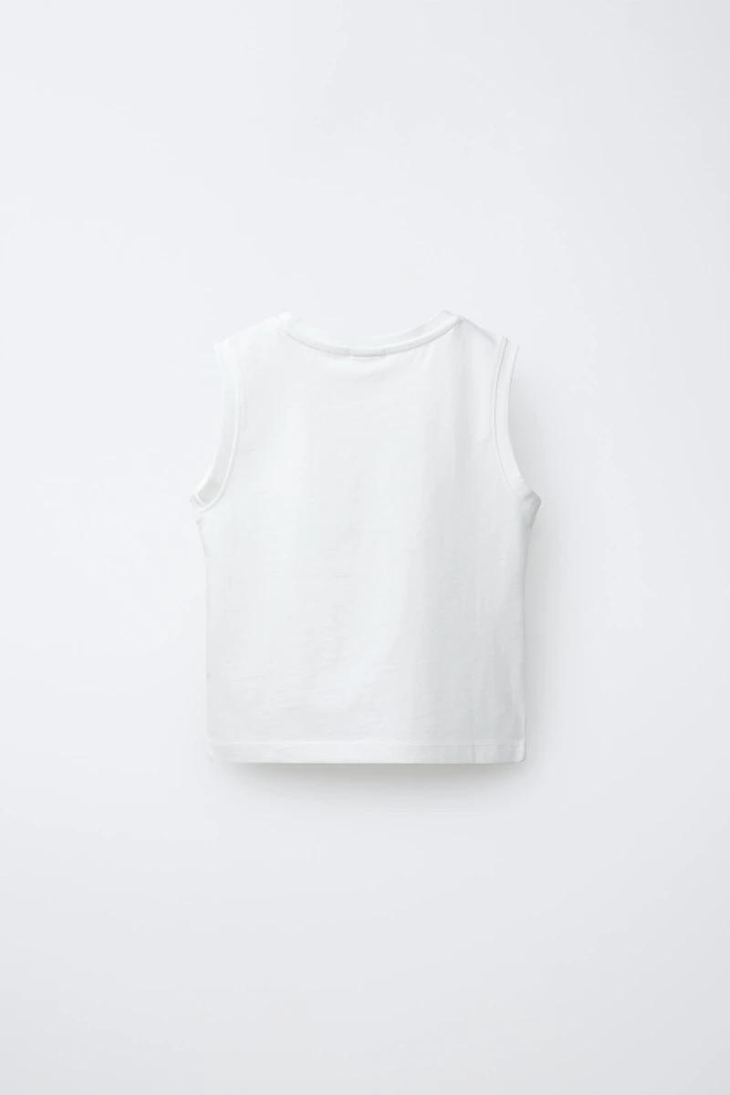 T-SHIRT UNI À POCHE