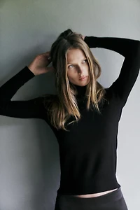 BUTTON KNIT SWEATER