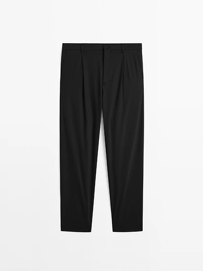 Relaxed fit trousers with darts