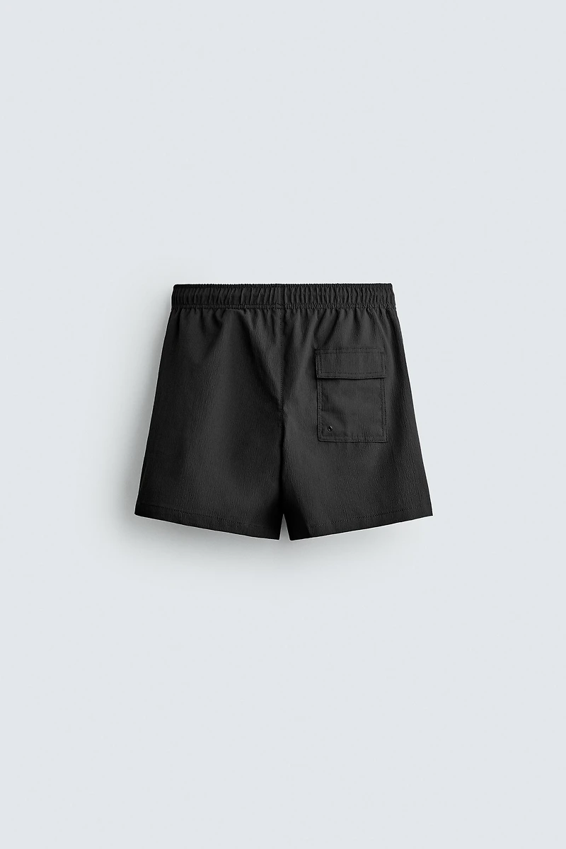 TEXTURED MID-LENGTH SWIMSUIT