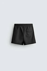 TEXTURED MID-LENGTH SWIMSUIT