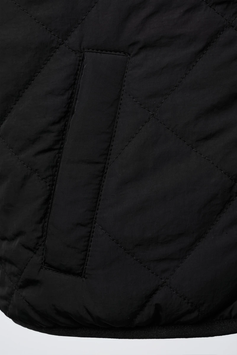 REVERSIBLE FLEECE VEST