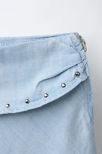 STUDDED FLOWY MIDI SKIRT