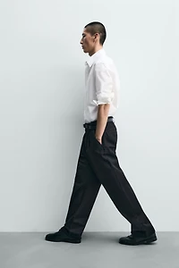 PANTALON CHINO EN DENIM À PLIS