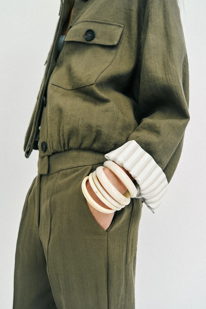 SHORT JACKET WITH ROLLED-UP SLEEVES