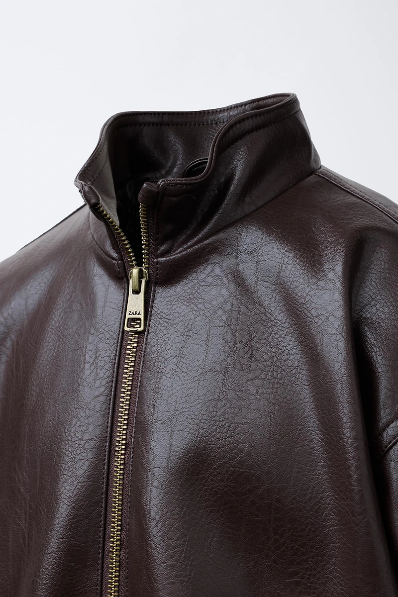BLOUSON EN MATIÈRE SYNTHÉTIQUE