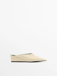 Mules à talon compensé