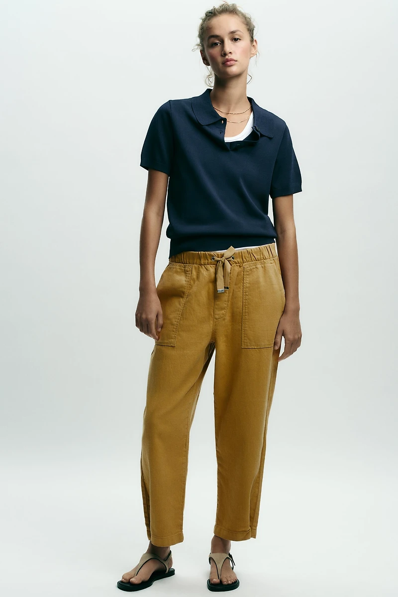 JOGGER PANTS WITH BUTTONED HEM