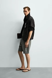RELAXED FIT PLEATED BELTED SHORTS