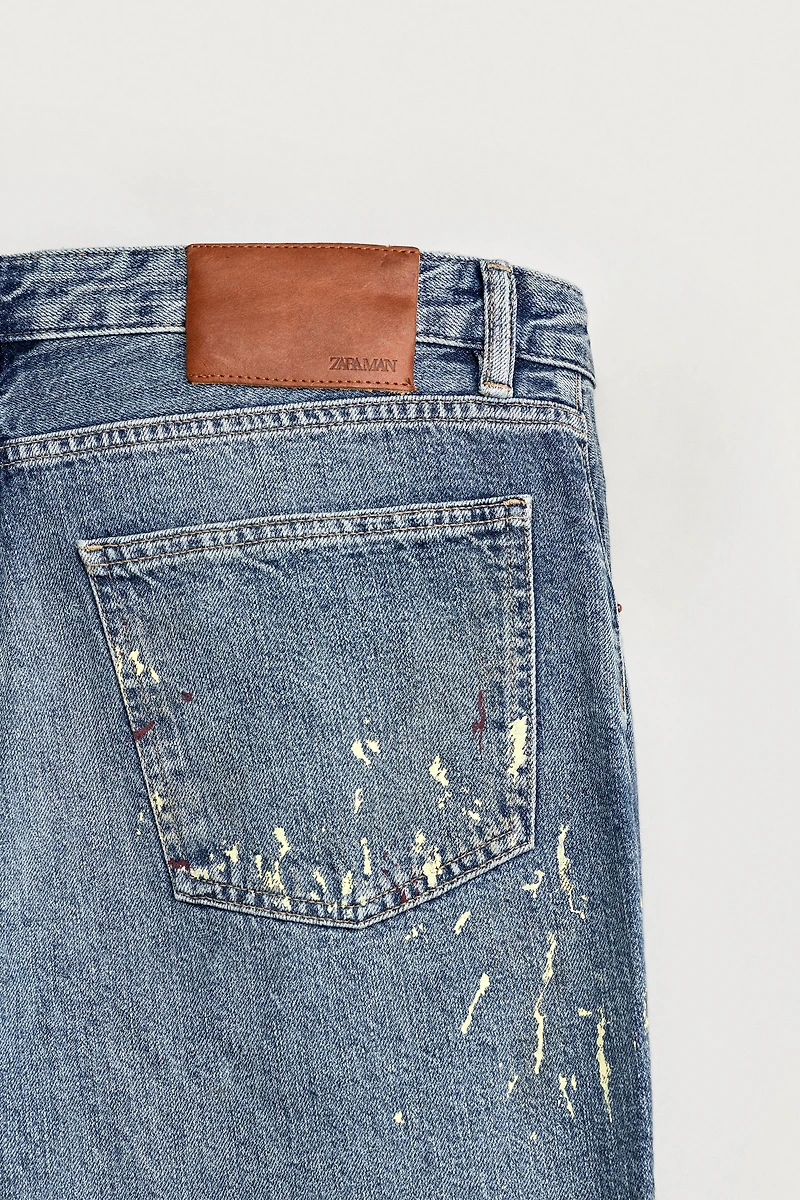 SPLATTER PRINT FLARE FIT JEANS
