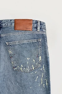 SPLATTER PRINT FLARE FIT JEANS