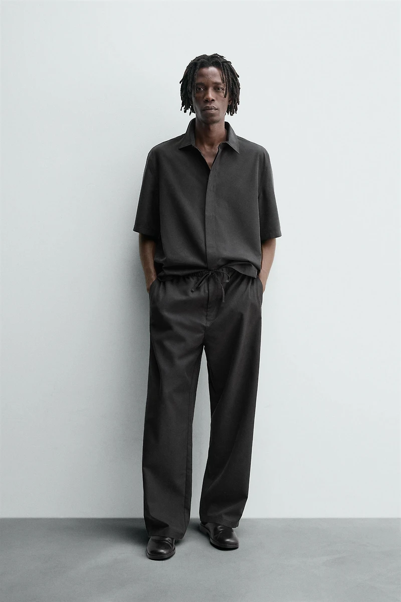 RELAXED FIT FLOWY PANTS