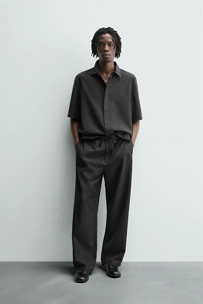 RELAXED FIT FLOWY PANTS
