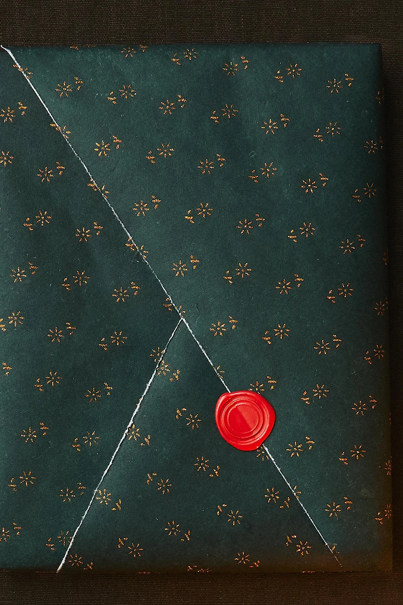 PAPIER CADEAU FLEURS PAILLETTÉES NOËL