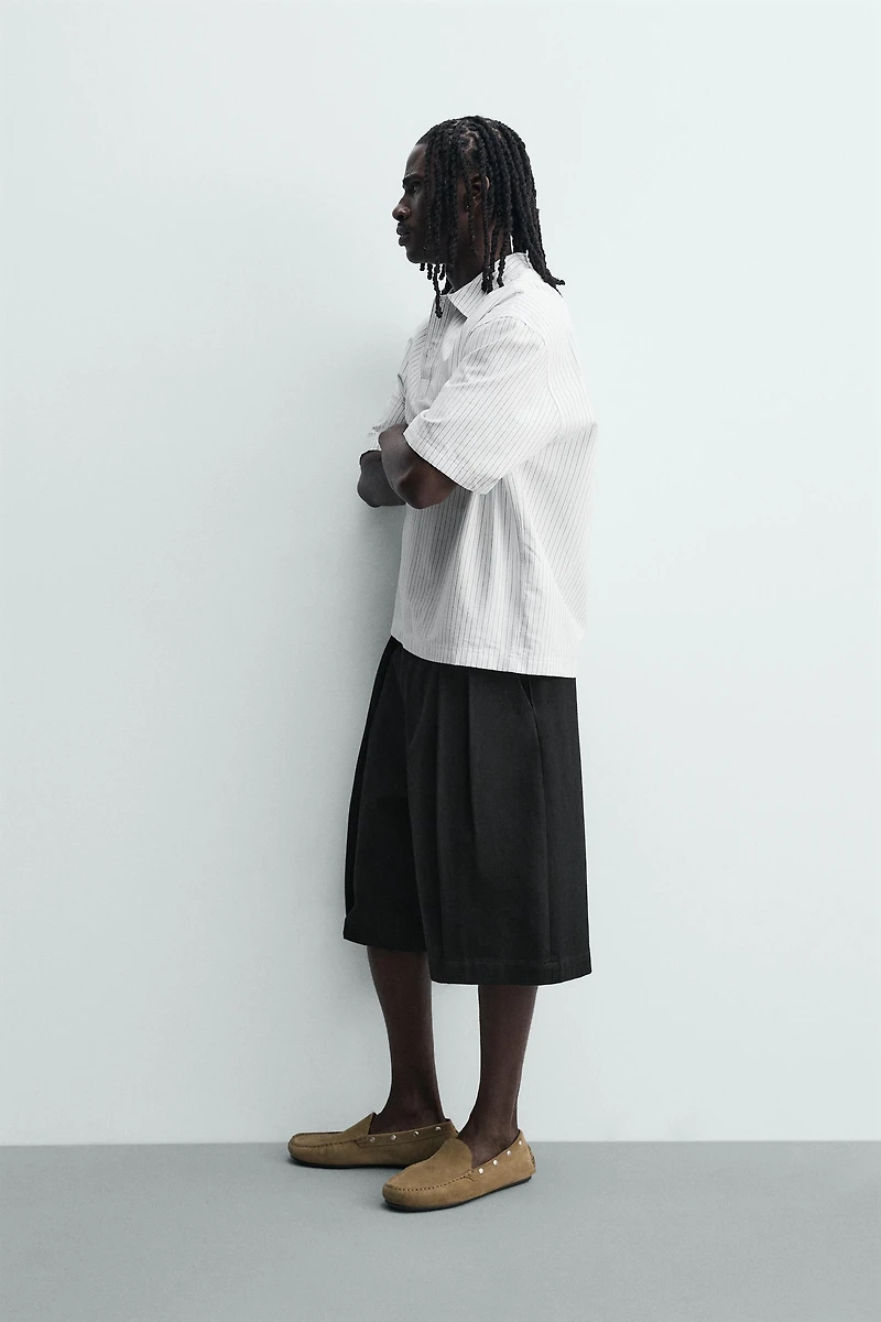 RELAXED FIT PLEATED SHORTS