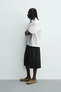 RELAXED FIT PLEATED SHORTS