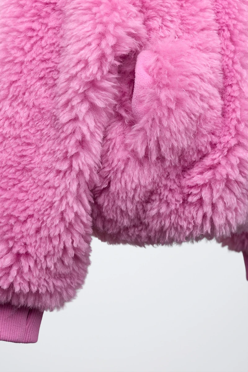 VESTE EFFET FOURRURE À CAPUCHE