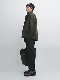 Water-repellent puffer jacket with pockets