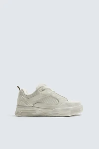 DISTRESSED THICK-SOLED SNEAKERS