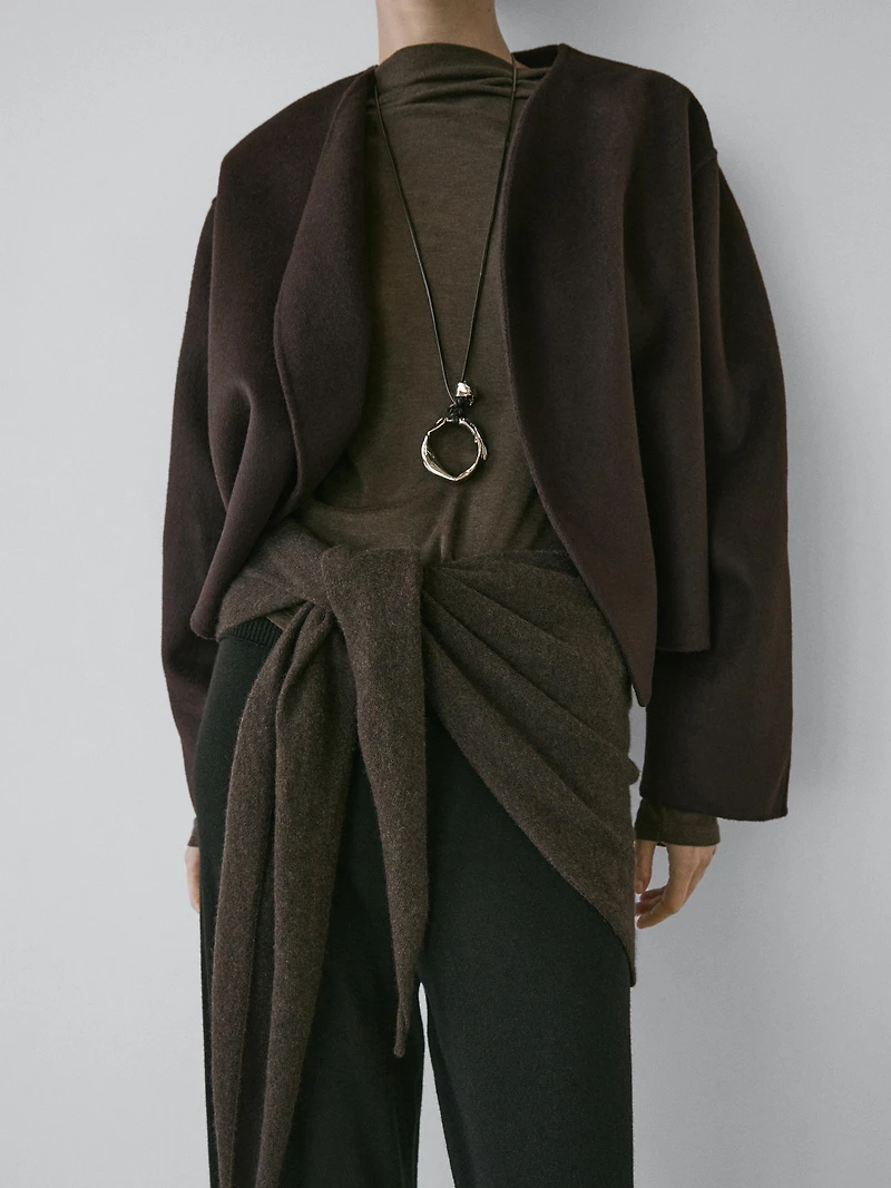 Short coat with rounded lapels