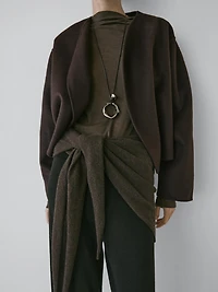 Short coat with rounded lapels