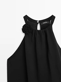 Knit cotton top with floral detail