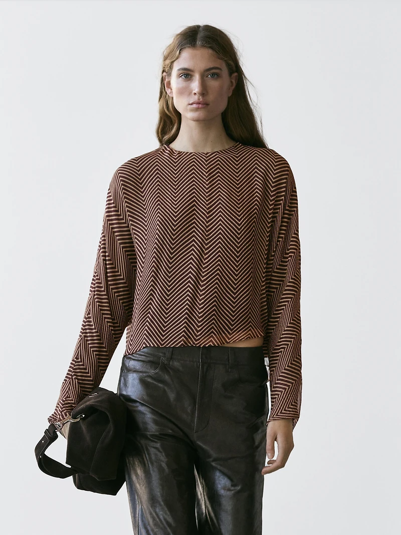 Flowing geometric print blouse