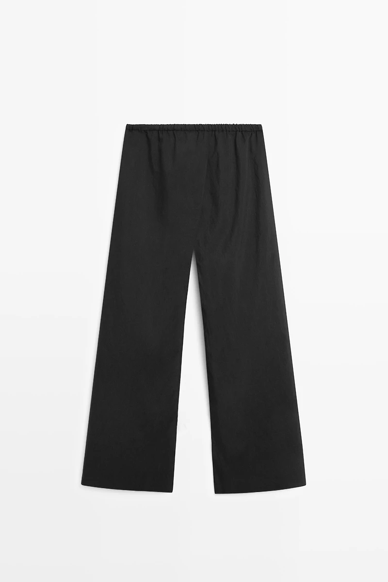 Double-layer pants with tie detail