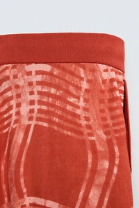 GRAPHIC PRINT KNIT PANTS © OTIS KWAME KYE QUAICOE