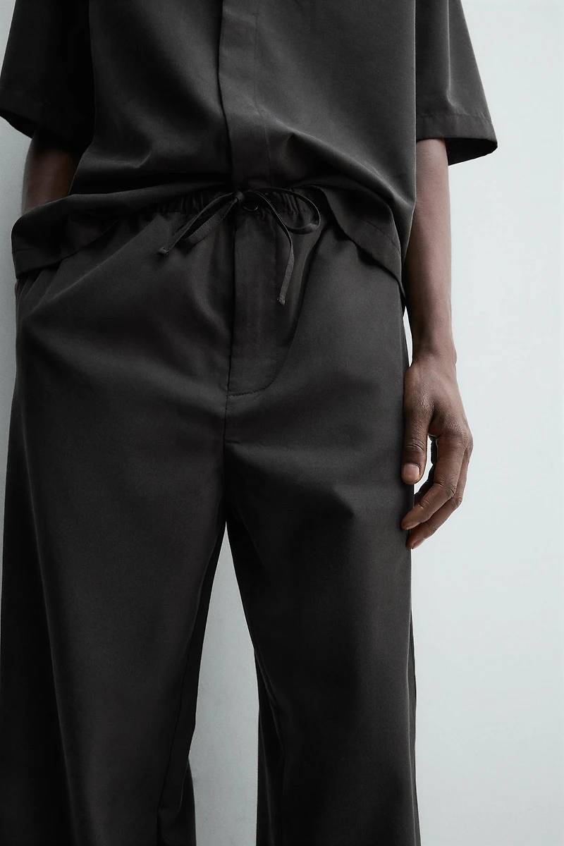 RELAXED FIT FLOWY PANTS