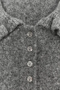 RUFFLED KNIT CARDIGAN