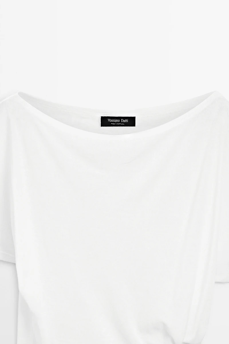 Asymmetric top with embroidered detail