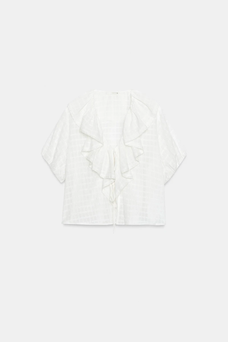 BLOUSE À VOLANTS ET LACETS